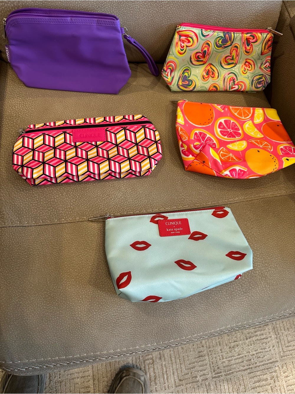 5 new colorful Clinique Cosmetic Pouches,one is Kate Spade. SKU 38